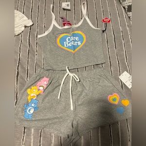 Women’s size Small 2 piece pajama set. Care Bears design.